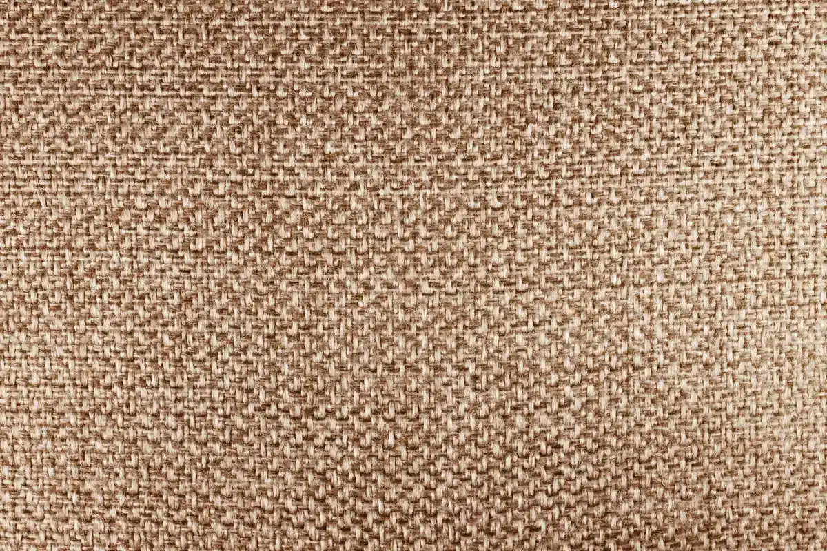 Différentes textures de tissus : lin, velours, coton, montrant la variété de matières pour choisir selon la pièce