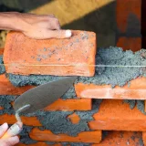Muret en pierre durable : étapes, outils et conseils pour réussir