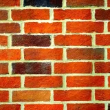 Pose d’un mur en briques : méthode, matériel et erreurs à éviter