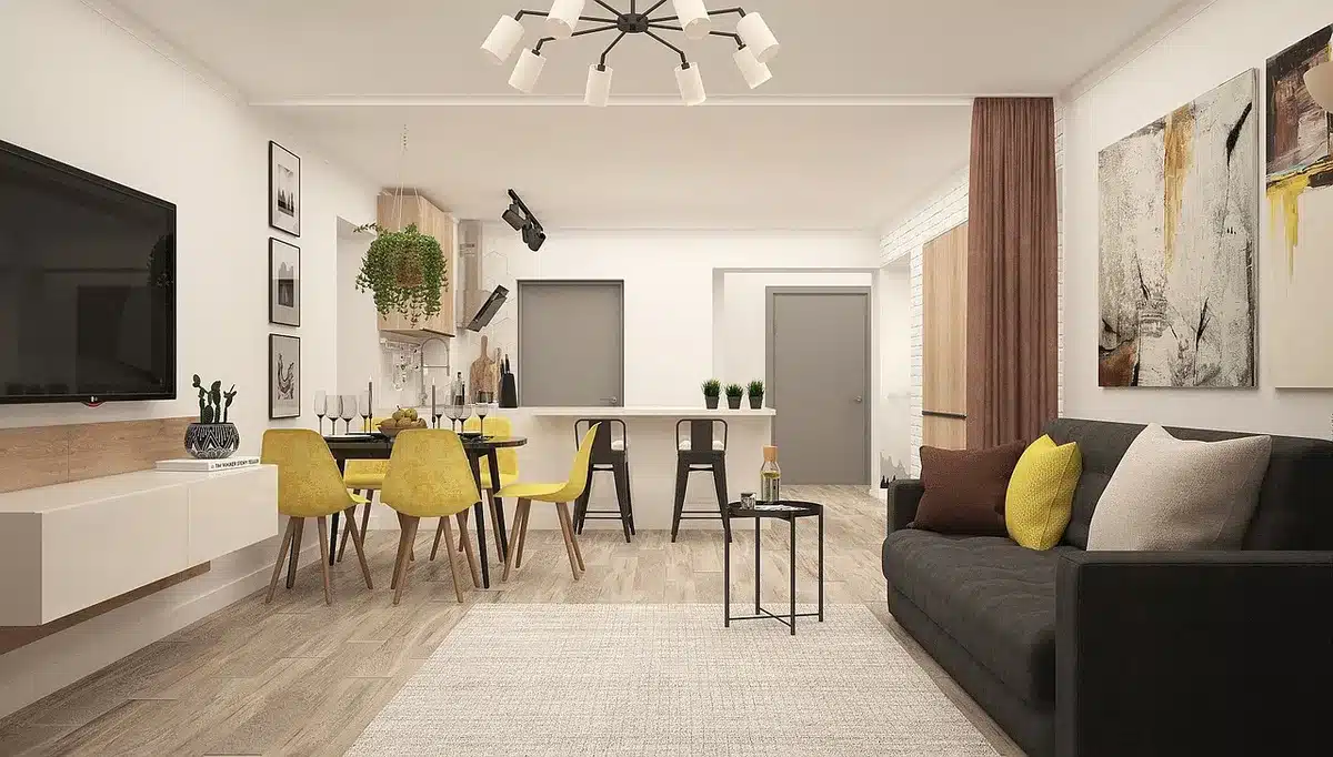 Salon lumineux aux murs blanc crème, avec touches de couleur terracotta et vert olive, carrelage décoratif et mobilier m